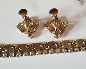 aurora borealis and gold-tone clip earrings and bracelet set, back
