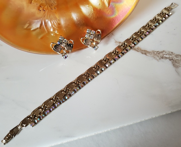 aurora borealis and gold-tone clip earrings and bracelet set