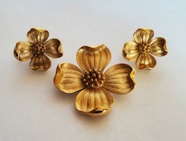 Crown Trifari dogwood flower brooch and clip earrings gold-tone set