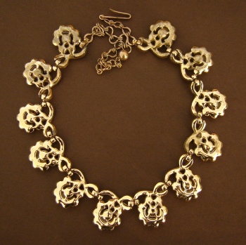 gold tone faux pearls and rhinestones necklace, back