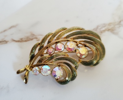 MJ ENT vintage gold-tone pin with aurora borealis