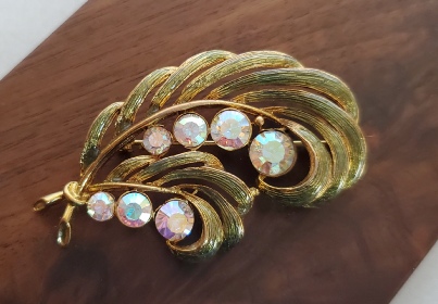 MJ ENT vintage feather brooch with aurora borealis