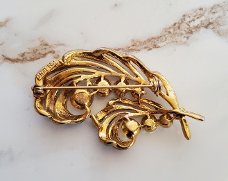 MJ ENT vintage brooch with aurora borealis back