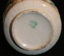 vintage Majolica pitcher with lilac flowers bottom