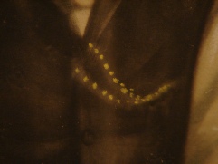 portrait of a man sitting in the garden, face detail