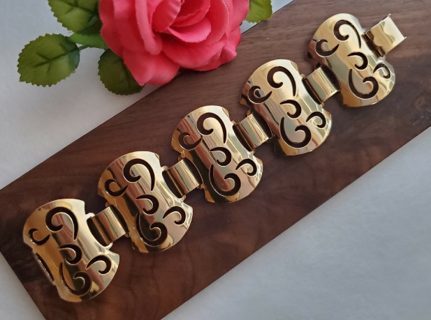 Sarah Coventry modern cut out gold-tone bracelet