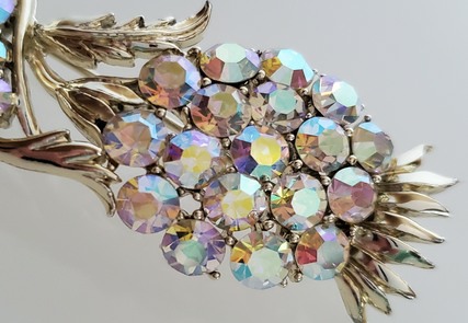 silver-tone cool aurora borealis thistle brooch detail