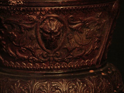 jardiniere with North Wind face and vines detail